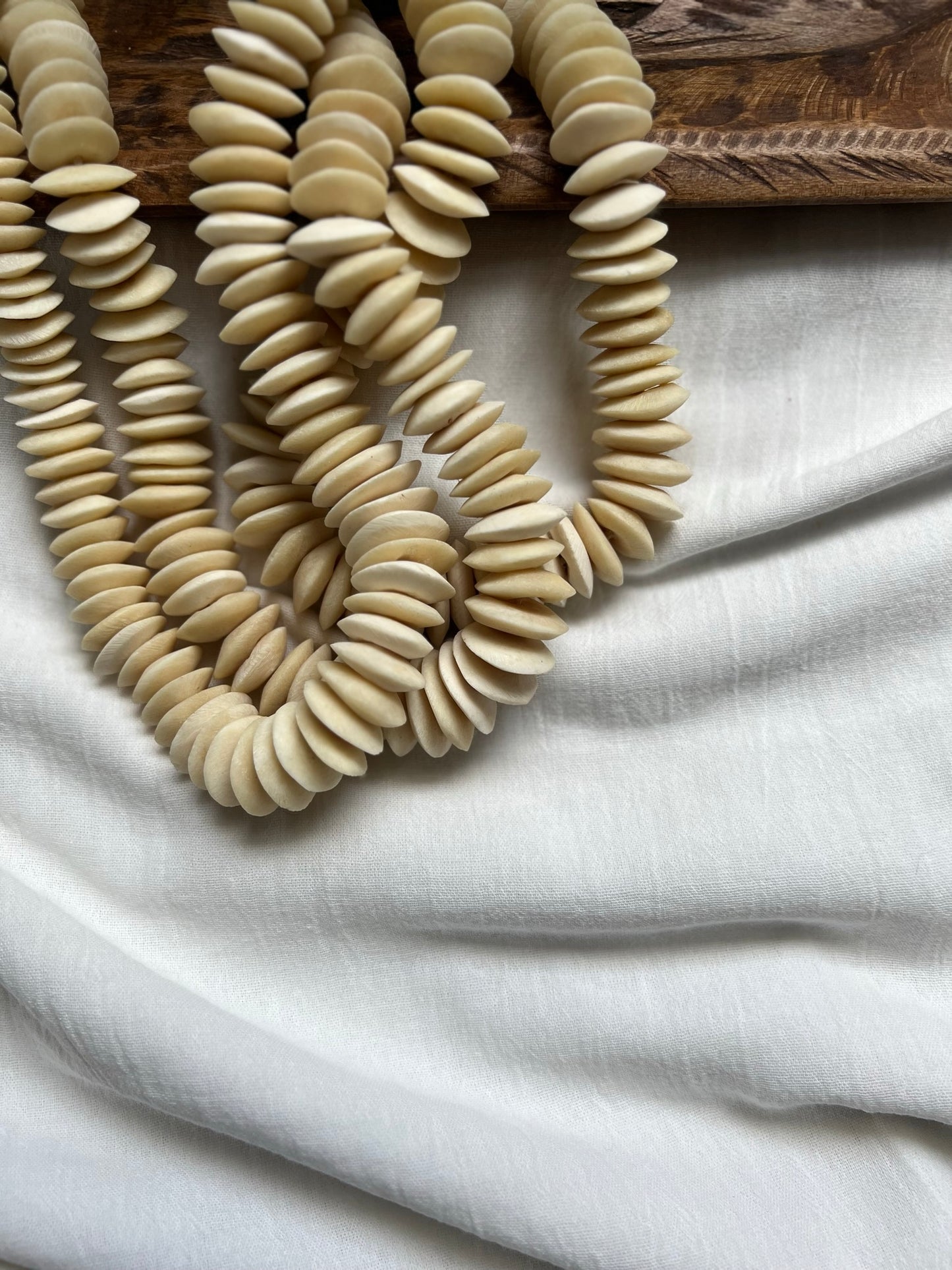 NATURAL SAUCER BONE BEAD