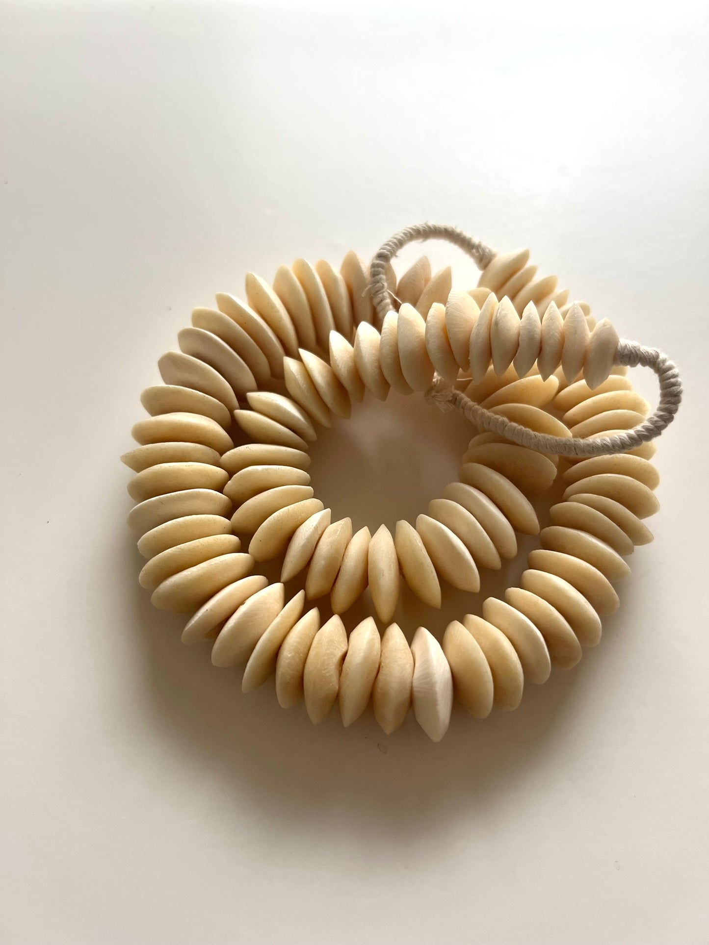 NATURAL SAUCER BONE BEAD