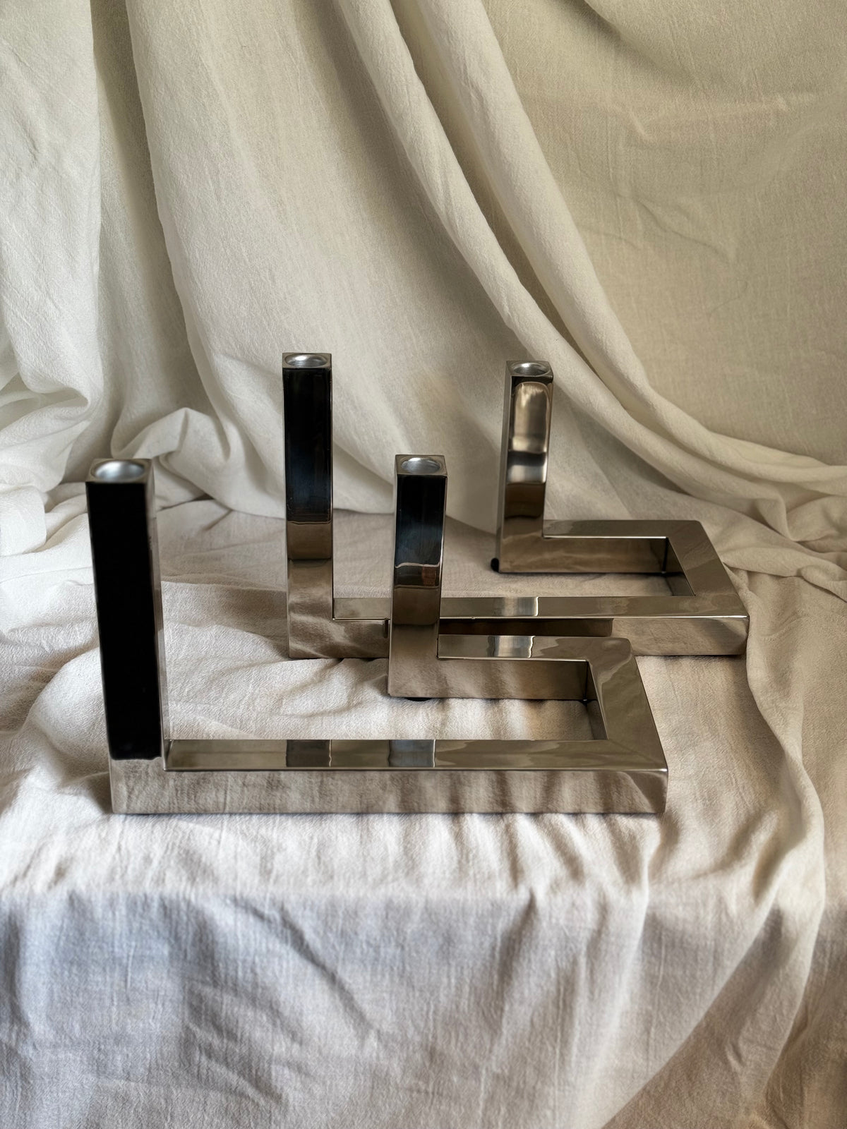 VINTAGE RIADO INTERLOCKING STAINLESS STEEL CANDLEHOLDER PAIR