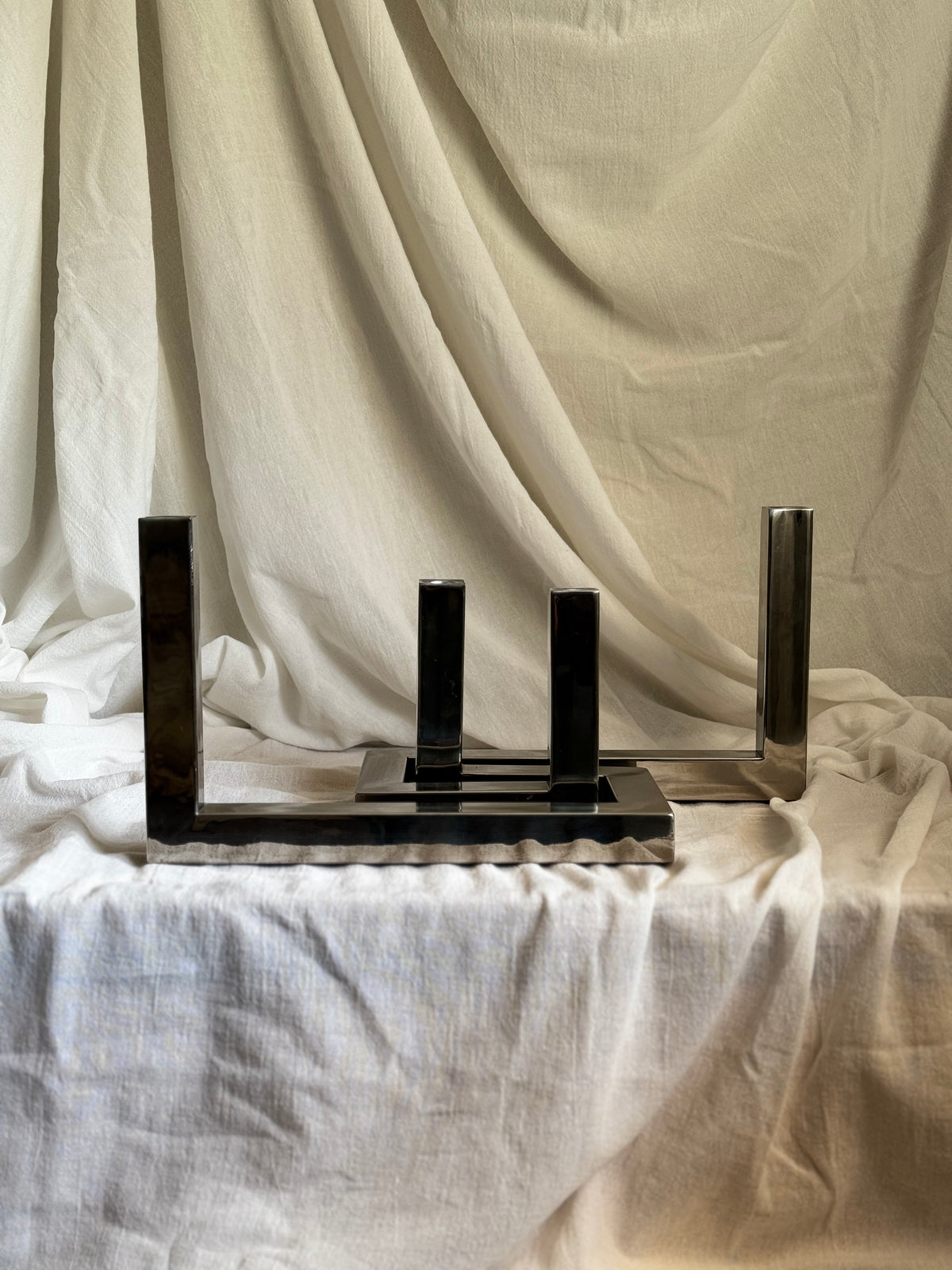 VINTAGE RIADO INTERLOCKING STAINLESS STEEL CANDLEHOLDER PAIR