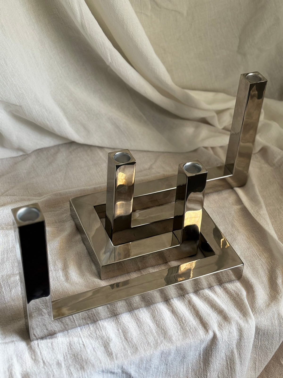 VINTAGE RIADO INTERLOCKING STAINLESS STEEL CANDLEHOLDER PAIR